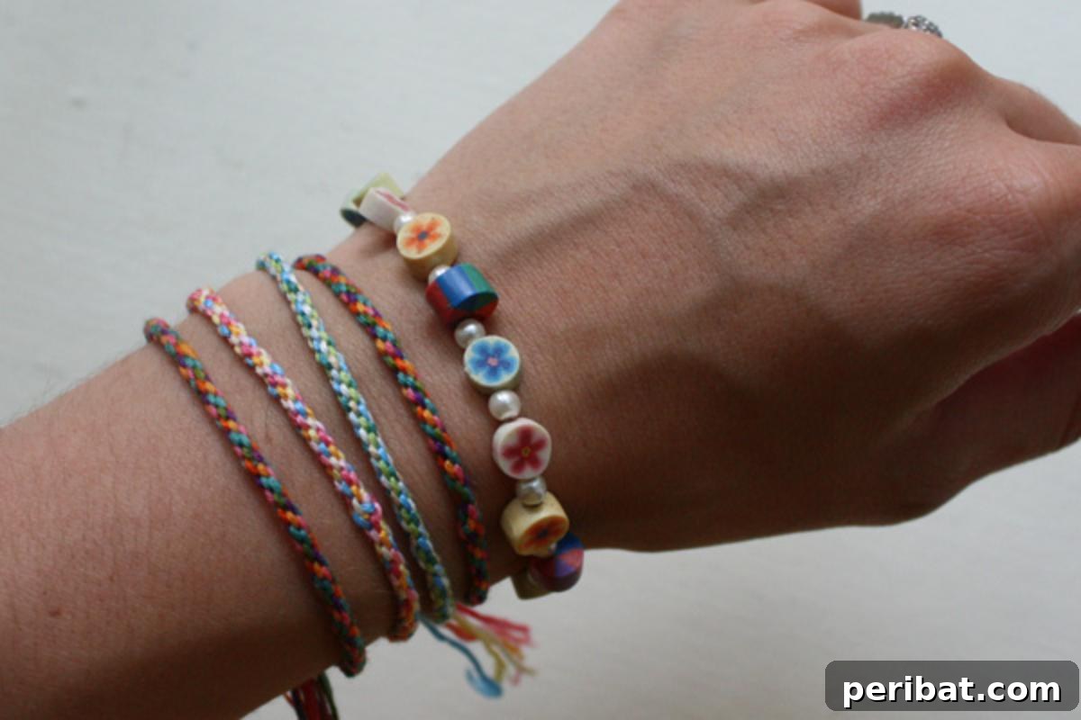 Neatly woven friendship bracelets using colorful thin yarn.
