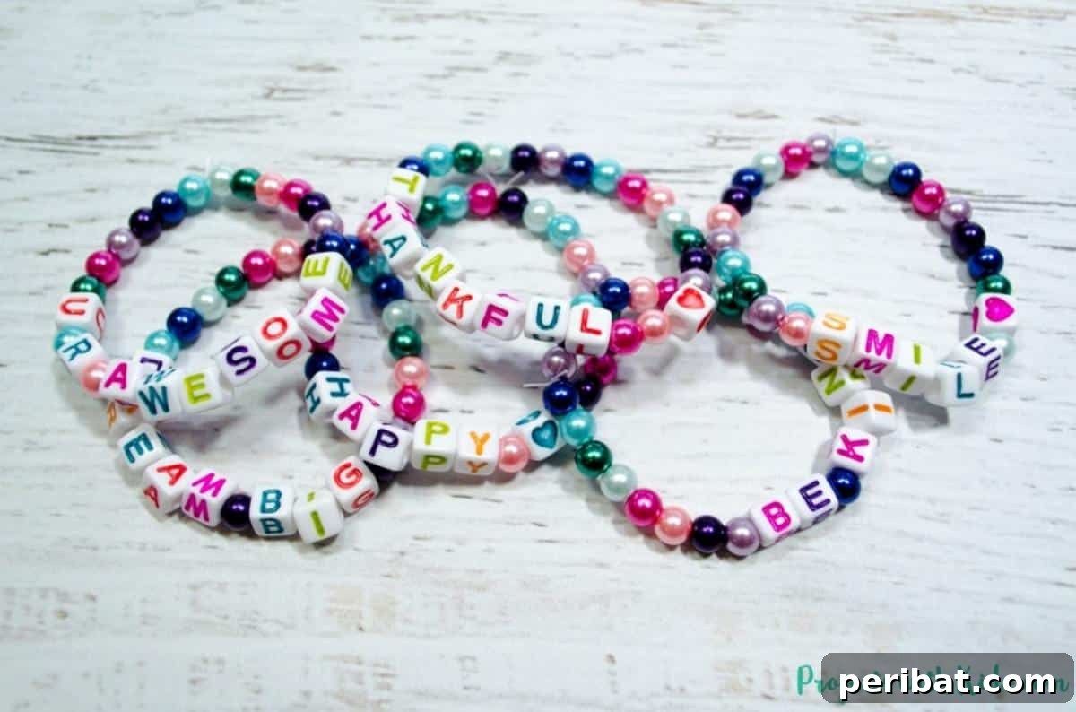 Smiling children proudly displaying their super cute DIY friendship bracelets.