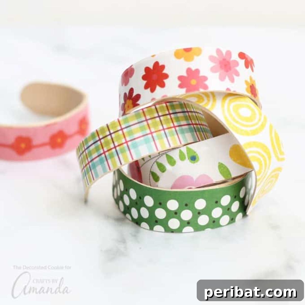 Decorated popsicle stick bracelets stacked creatively.