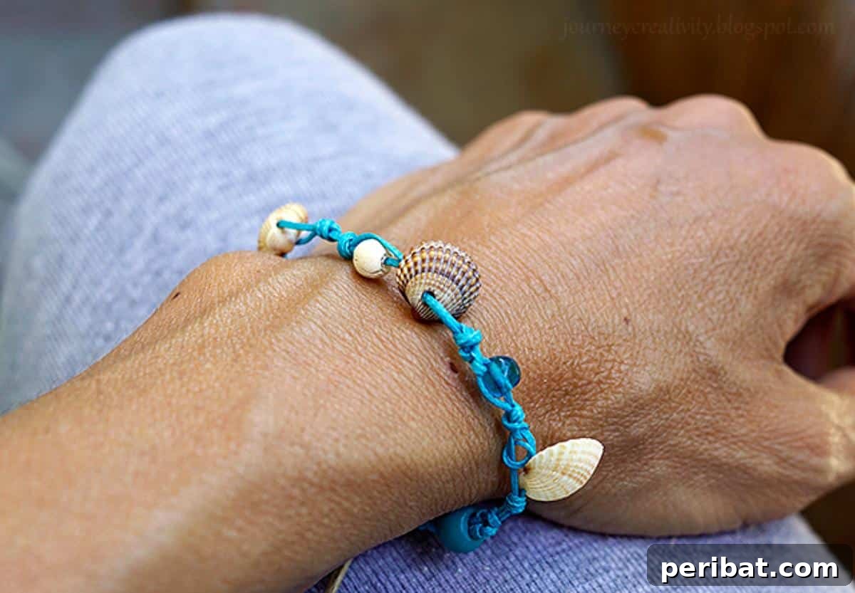 A charming sea shell bracelet with various small shells.