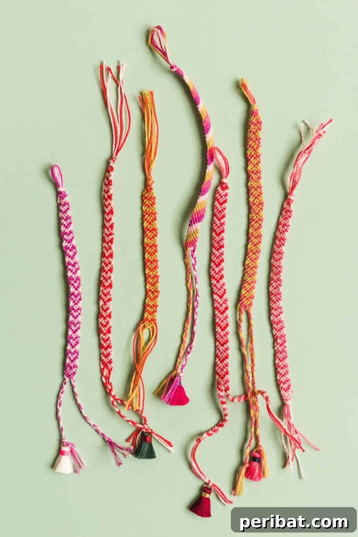 A detailed close-up of a heart-patterned friendship bracelet.