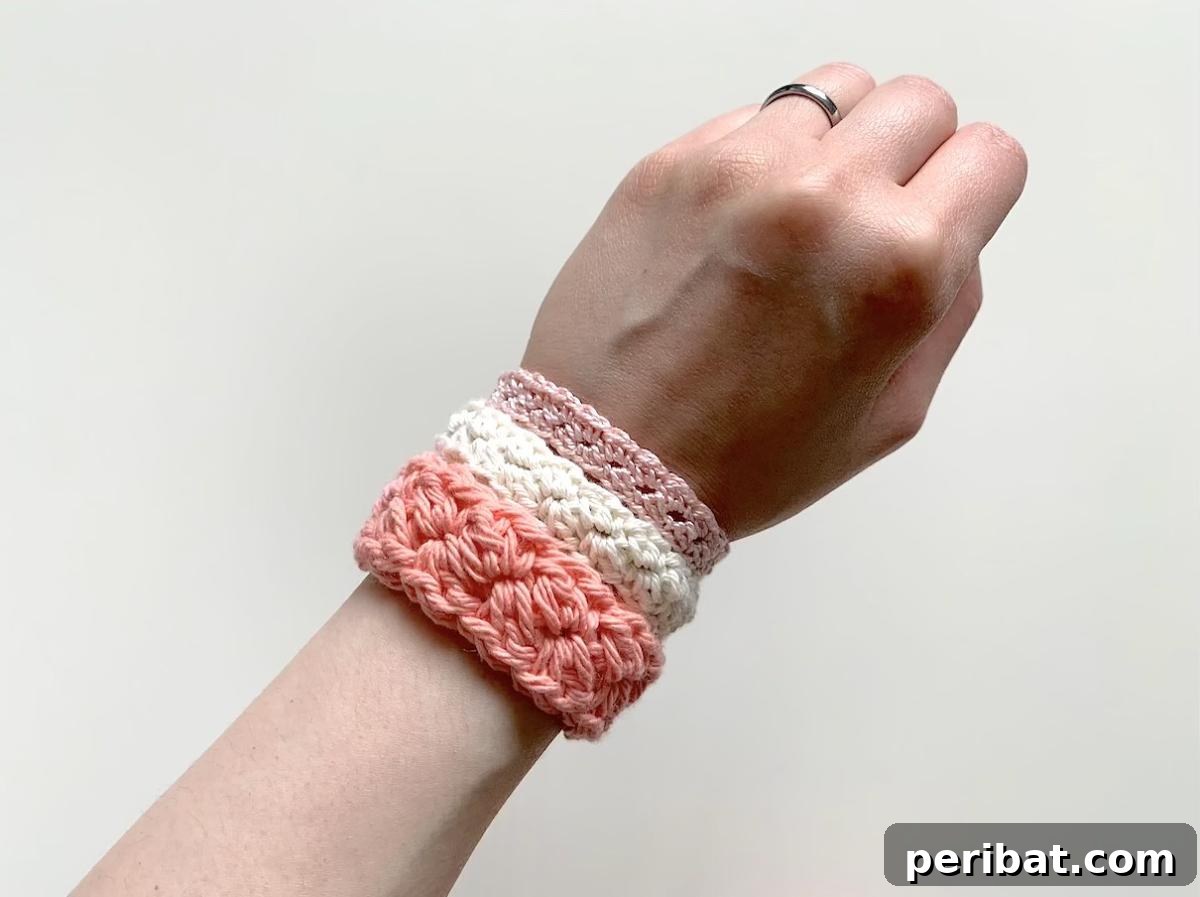 Delicate crocheted bracelets in various yarn colors.