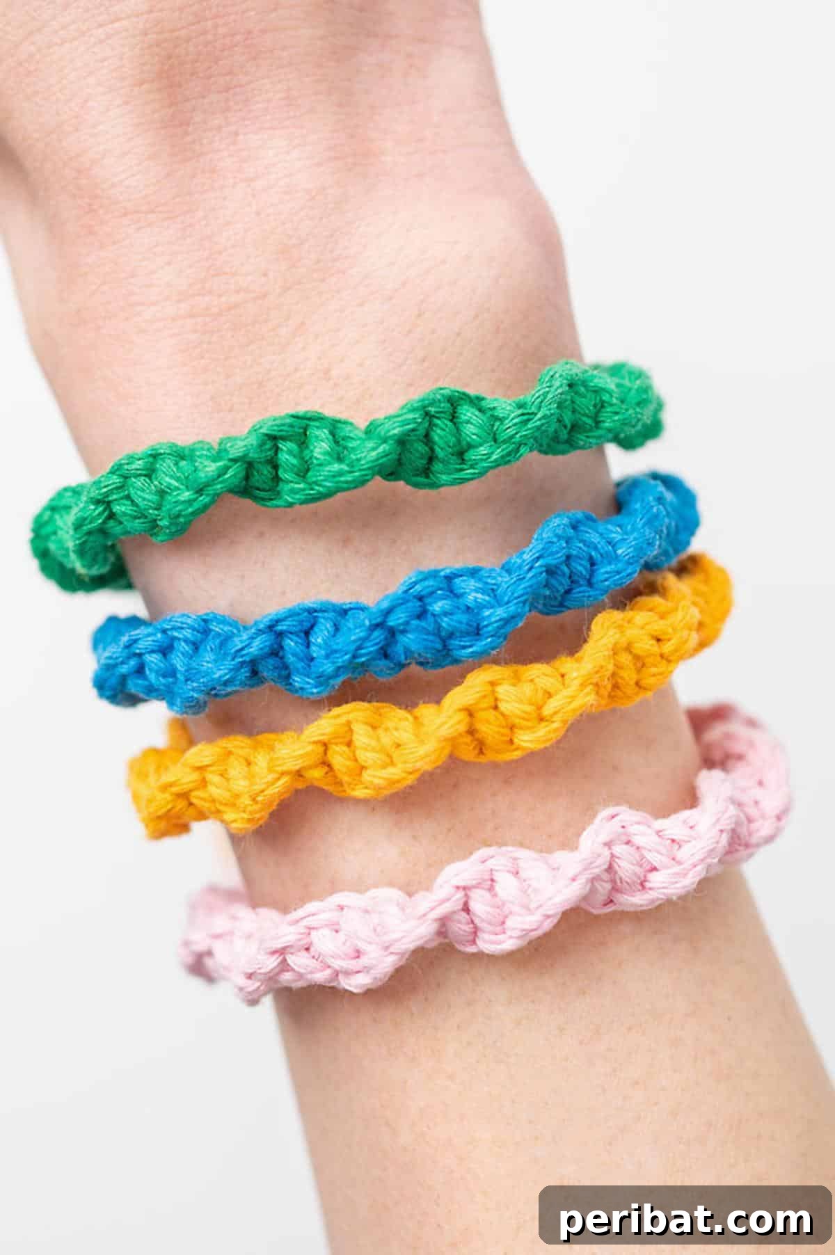 Intricately knotted macrame bracelets in natural tones.