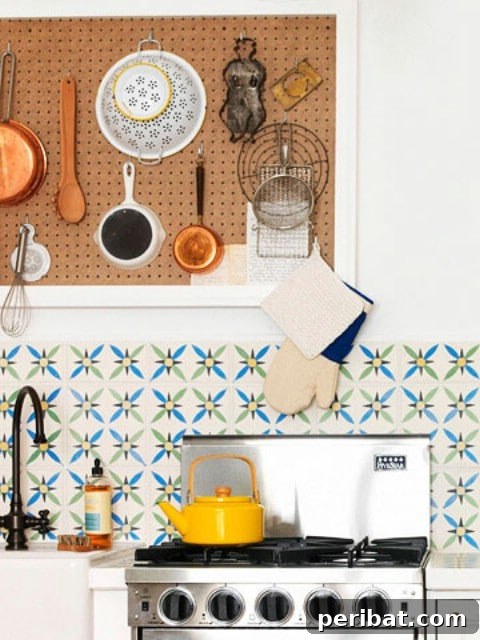 Kitchen pegboard organizing various cooking equipment and accessories