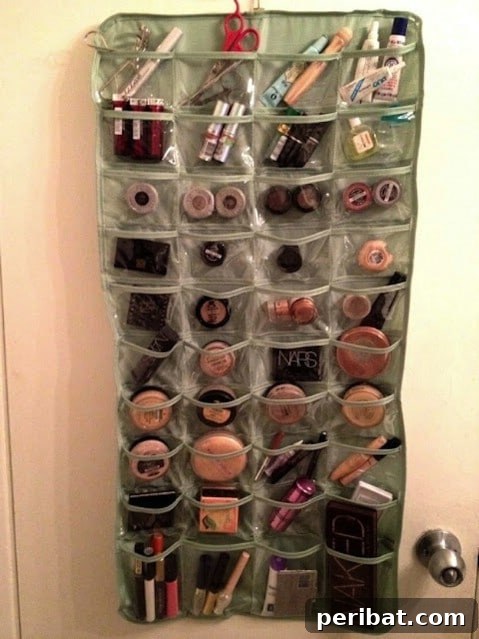 DIY hanging makeup organizer made from clear plastic pockets