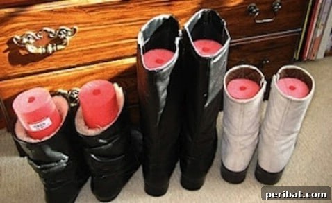 Tall boots kept upright and shaped with pieces of pool noodle