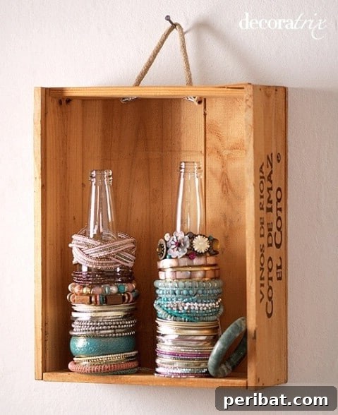 Decorative glass bottles used to display bracelets and hair ties