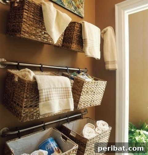 Bathroom wall storage with hanging baskets and rails for toiletries