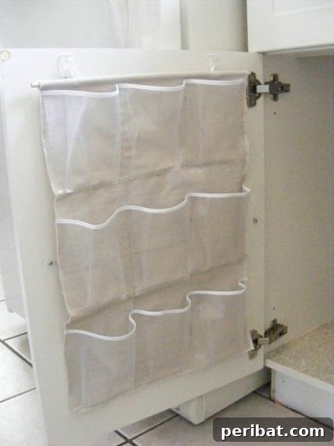 Small pocket shoe holders attached to the inside of a pantry cabinet door