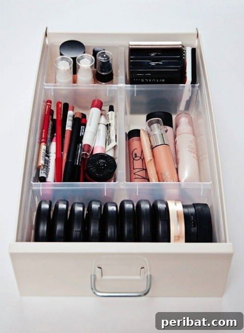Drawer with internal dividers organizing cosmetics and beauty products