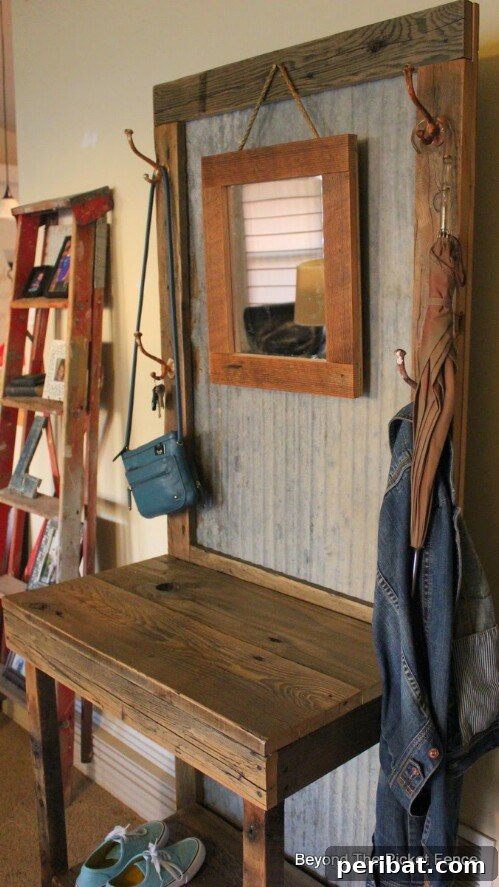 Reclaimed Wood Wonders for a Stylish Sustainable Home 32 Hall tree made from reclaimed wood with mirror, hooks, desk, and shoe storage