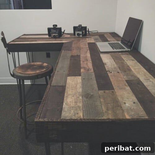 Reclaimed Wood Wonders for a Stylish Sustainable Home 36 Rustic L-shaped desk made from various colored reclaimed wood