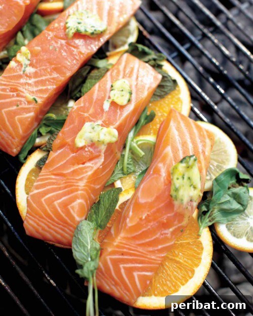 Grilling Game Changers Smart Hacks for Your Best BBQ Ever 17 Fish fillets grilling on top of citrus slices on the grate