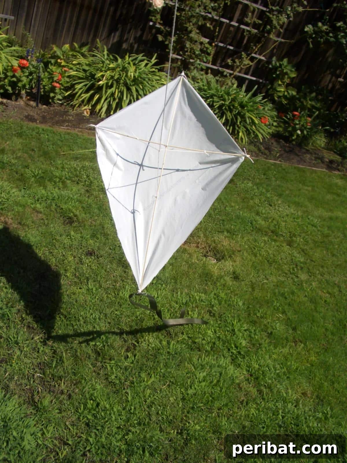 35 DIY Summer Adventures for Your Most Epic Season Yet 20 Make A Diamond Kite Using a Plastic Bag.
