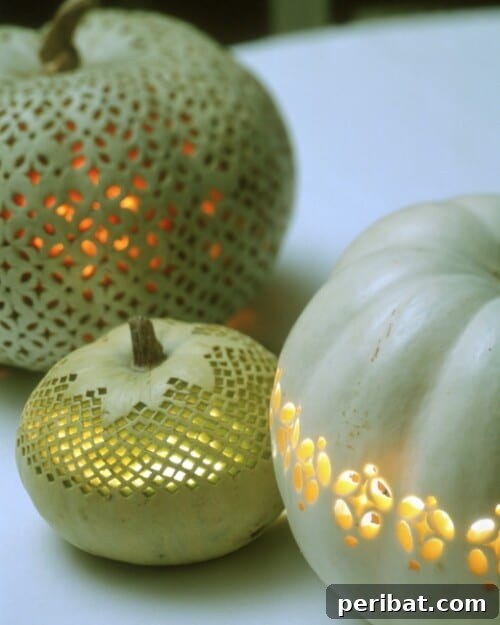 Lace Openwork Pumpkins with intricate carved patterns and negative space