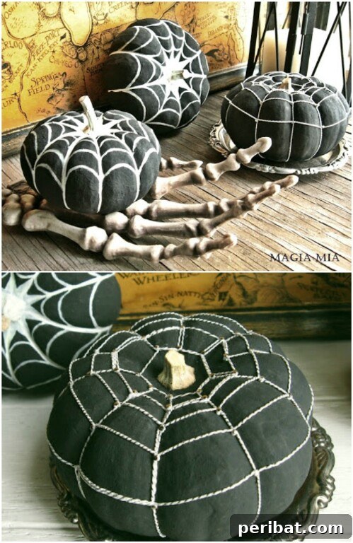 Black pumpkins with white designs, including spider webs and bones for a chic Halloween