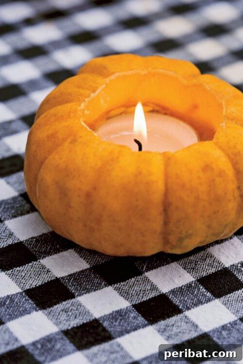 Miniature Pumpkin Votive Candles, perfect for a Halloween party table or fall ambiance