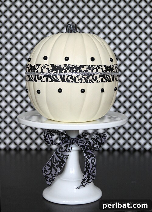 Black & White Centerpiece Pumpkin with a lovely design and ribbon accent