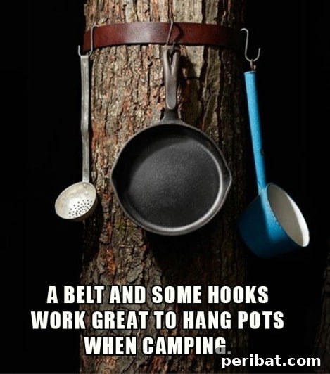 Hang your pots and pans easily using a belt, maximizing camp kitchen space