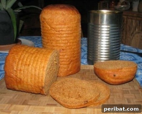 Tin Can Sandwich Bread Recipe - Freshly baked bread over the campfire