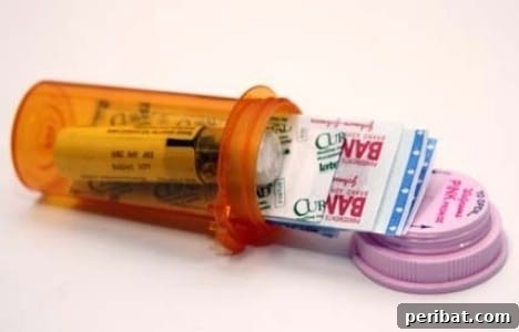 DIY mini first-aid kit using a prescription bottle for compact emergency supplies