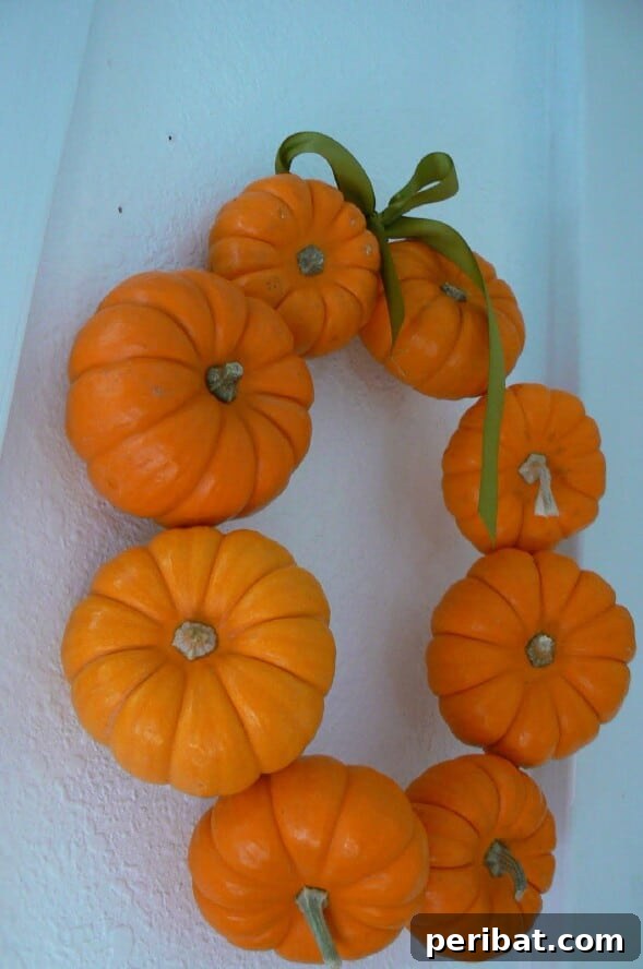 60 Cozy Fall DIY Projects to Transform Your Home for Autumn 62 Mini Pumpkin Wreath