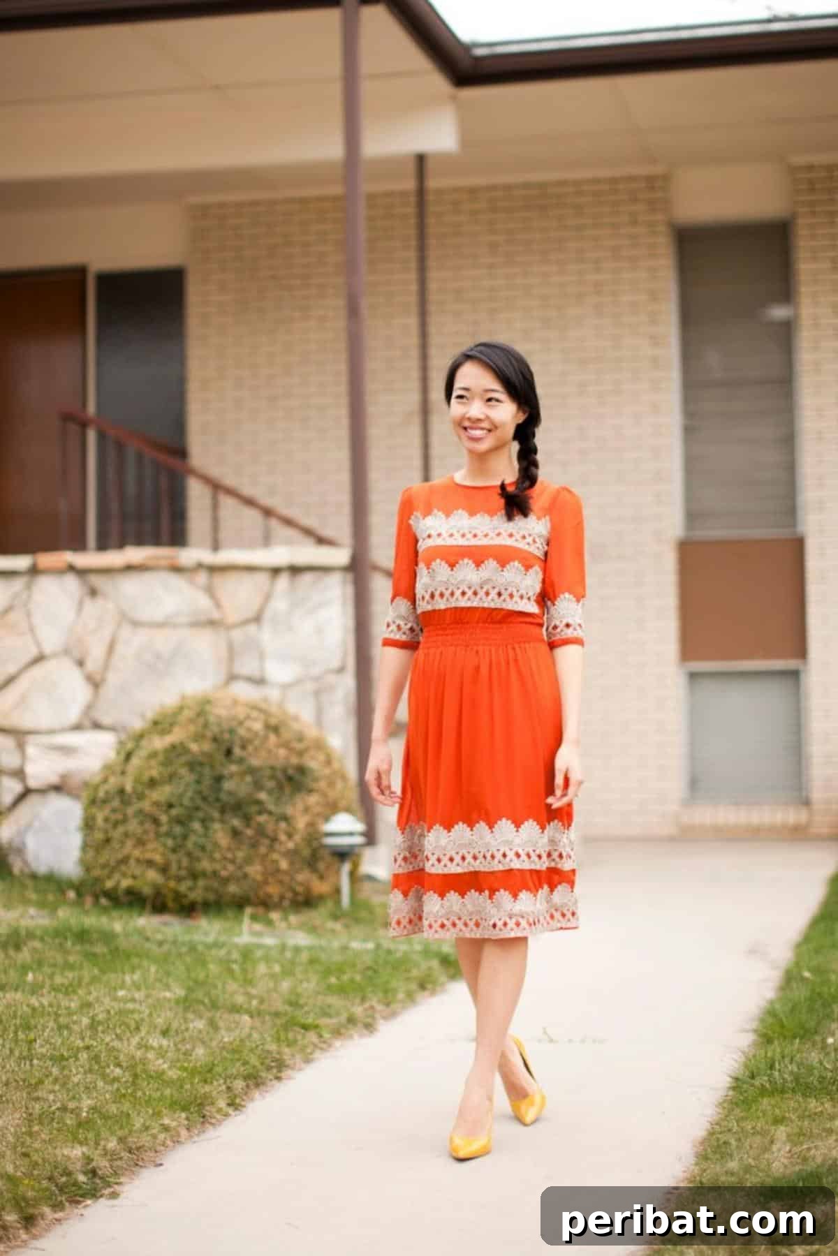 32 Clever Anthropologie Style DIY Projects 17 DIY 300$ Anthropologie Tangerine Flicker Dress DIY, showcasing a vibrant, flowy garment.