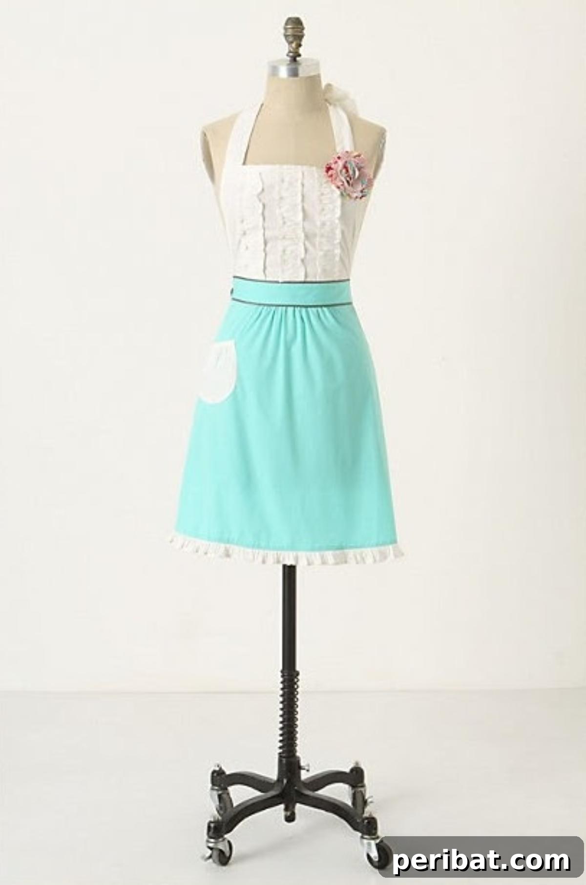 32 Clever Anthropologie Style DIY Projects 5 Anthropologie Apron knock off featuring floral patterns and ruffle details.