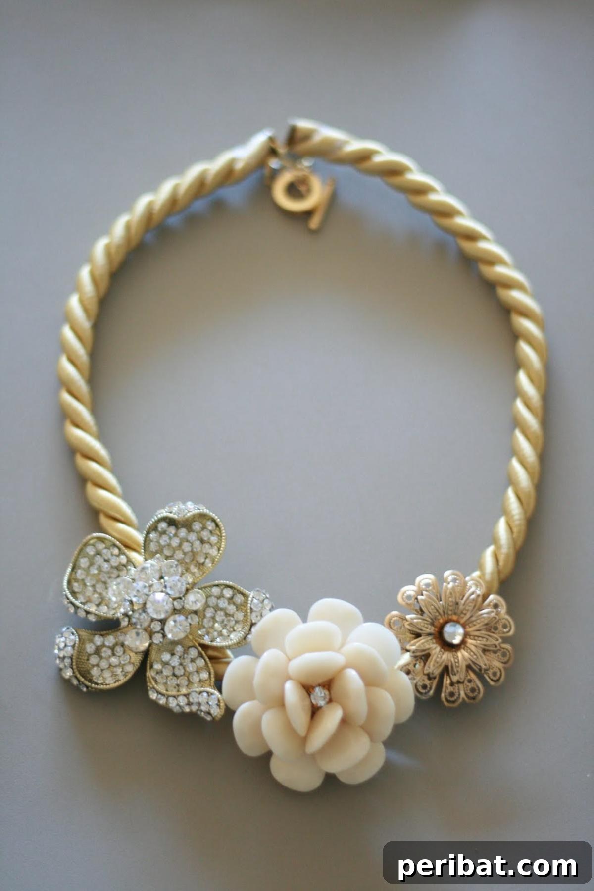 32 Clever Anthropologie Style DIY Projects 8 Anthro DIY Marjorelle Necklace, a statement piece with colorful beads and fabric flowers.