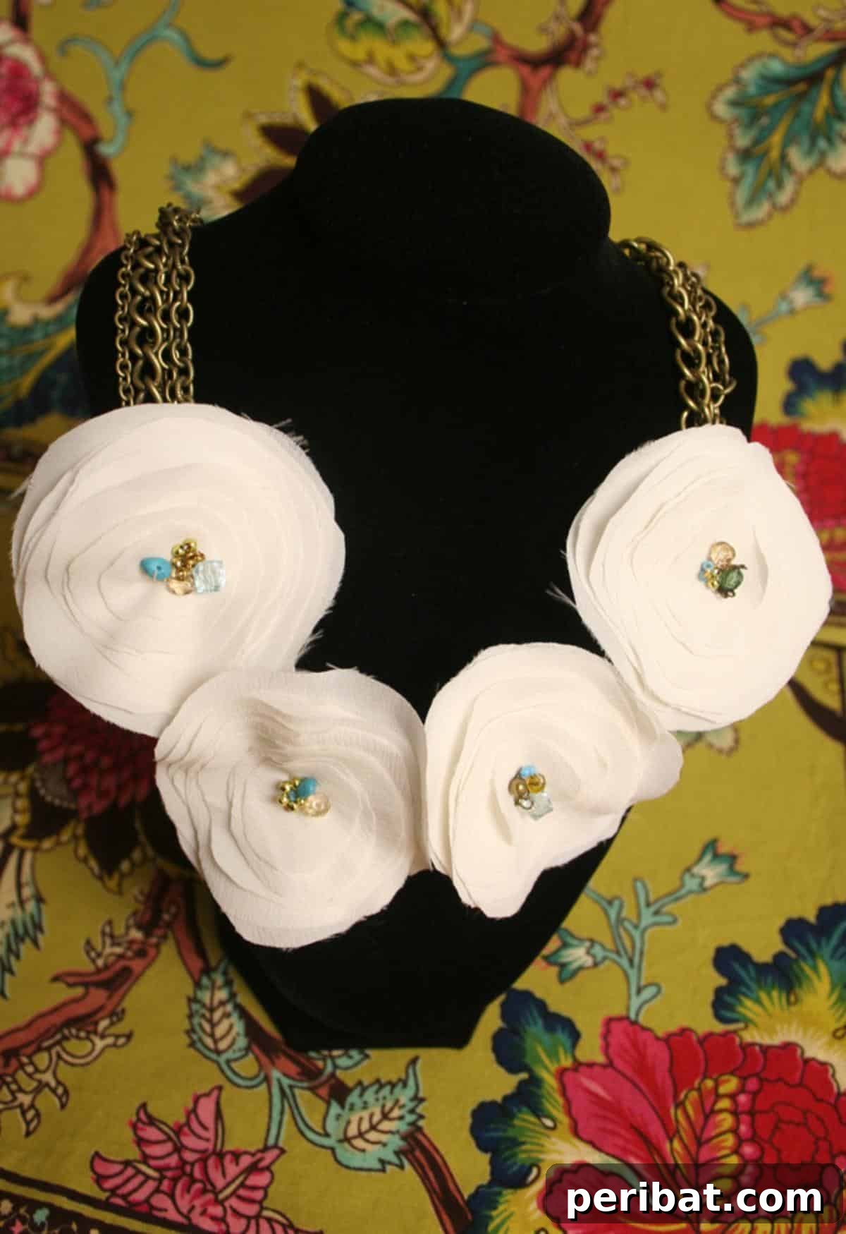 32 Clever Anthropologie Style DIY Projects 9 DIY Anthropologie Ranuncula Necklace with delicate fabric flowers.