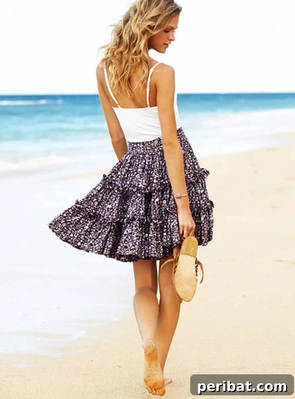 Craft 15 Chic Summer Skirts: Free DIY Patterns and Tutorials 8 DIY XOX Skirt, featuring a unique skirt design, possibly with criss-cross details or a modern silhouette, exuding a playful and contemporary vibe.