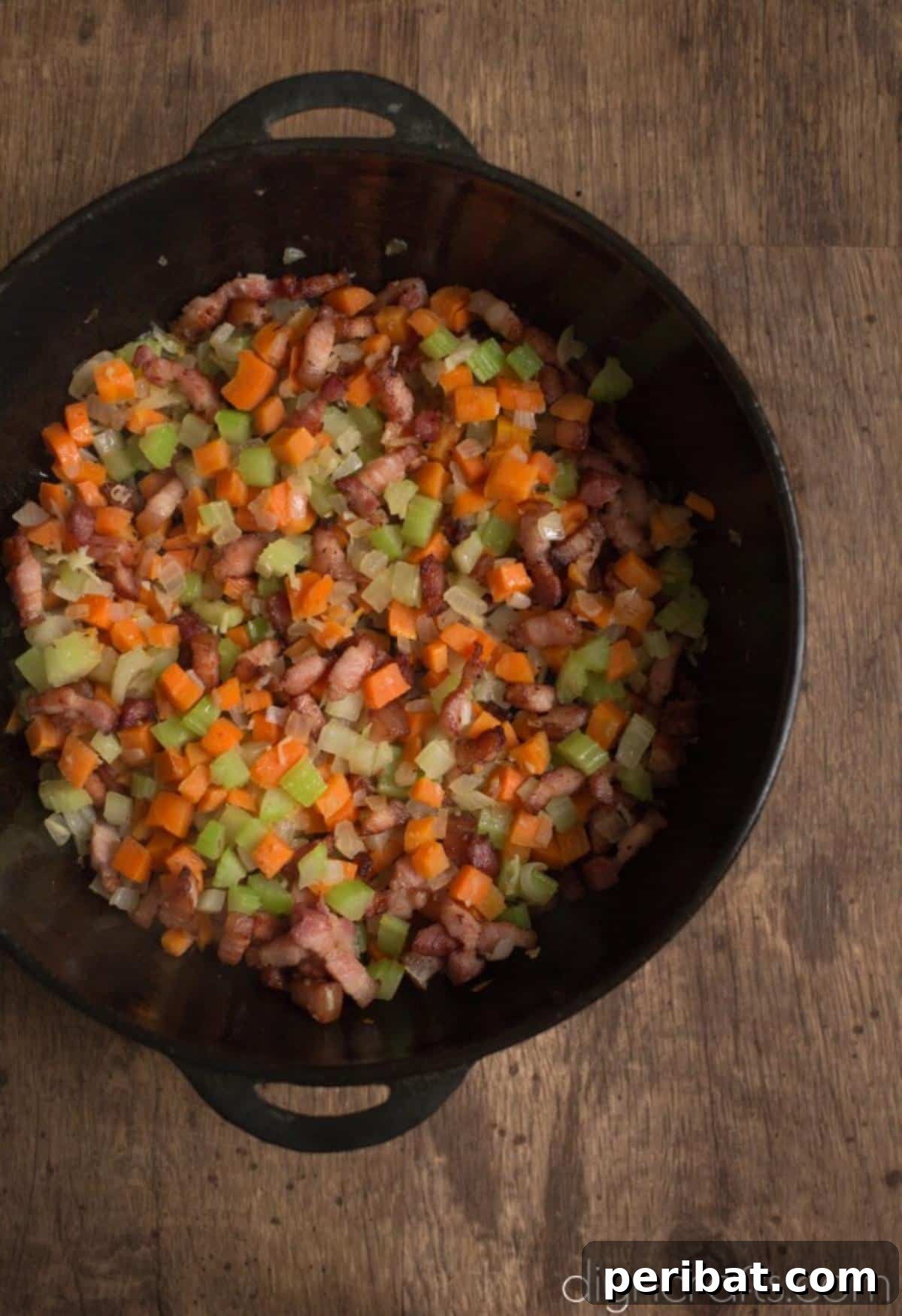 Hearty White Bean and Crispy Bacon Soup: Your Winter Blues Remedy 5 Various soup ingredients like diced vegetables, beans, and liquids being mixed together in a large pot, ready for simmering.