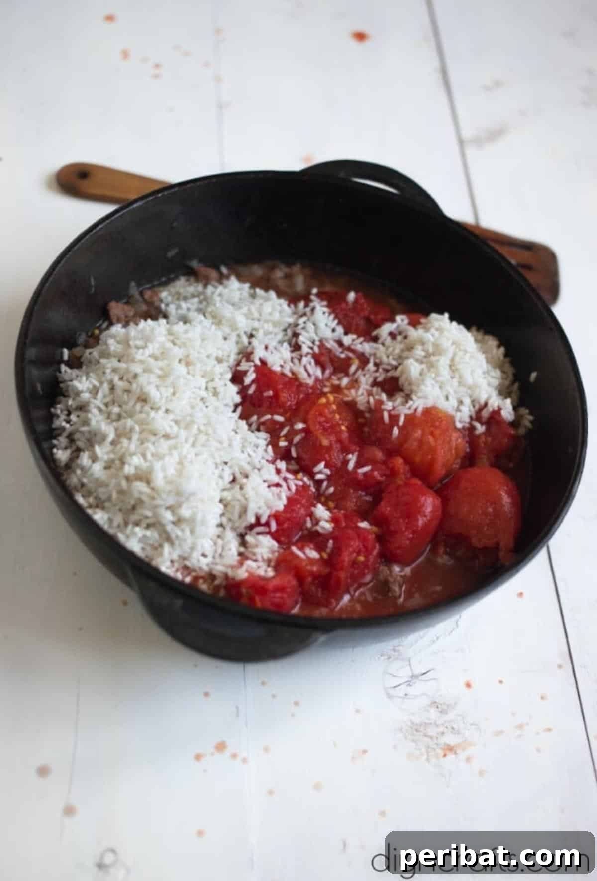 Golden Cheesy Cabbage Perfection 6 Rice cooking in rich tomato juice