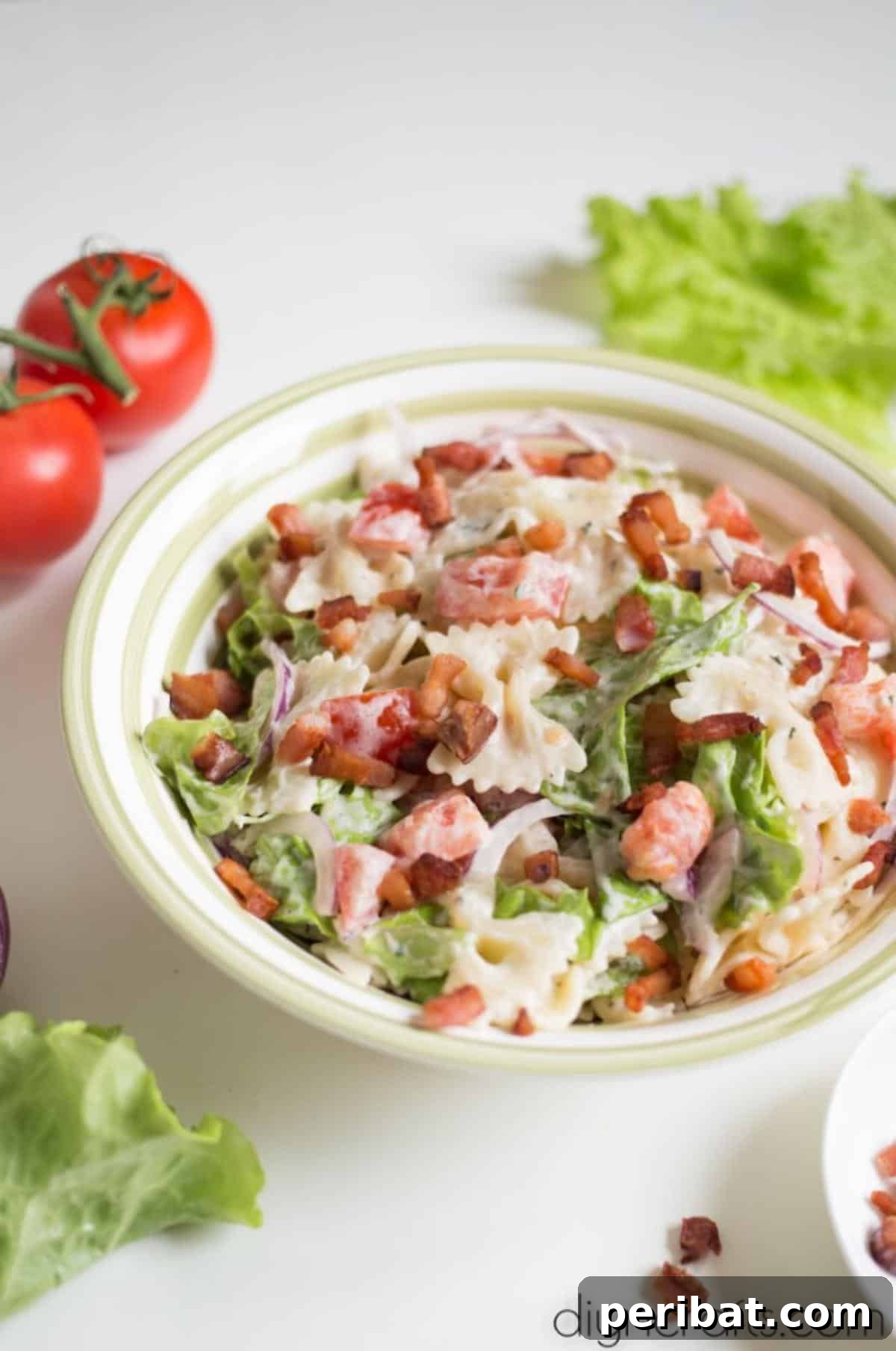 Irresistible BLT Pasta Salad: Recipe Requests Guaranteed 7 A large bowl of finished BLT pasta salad, garnished and ready to serve.