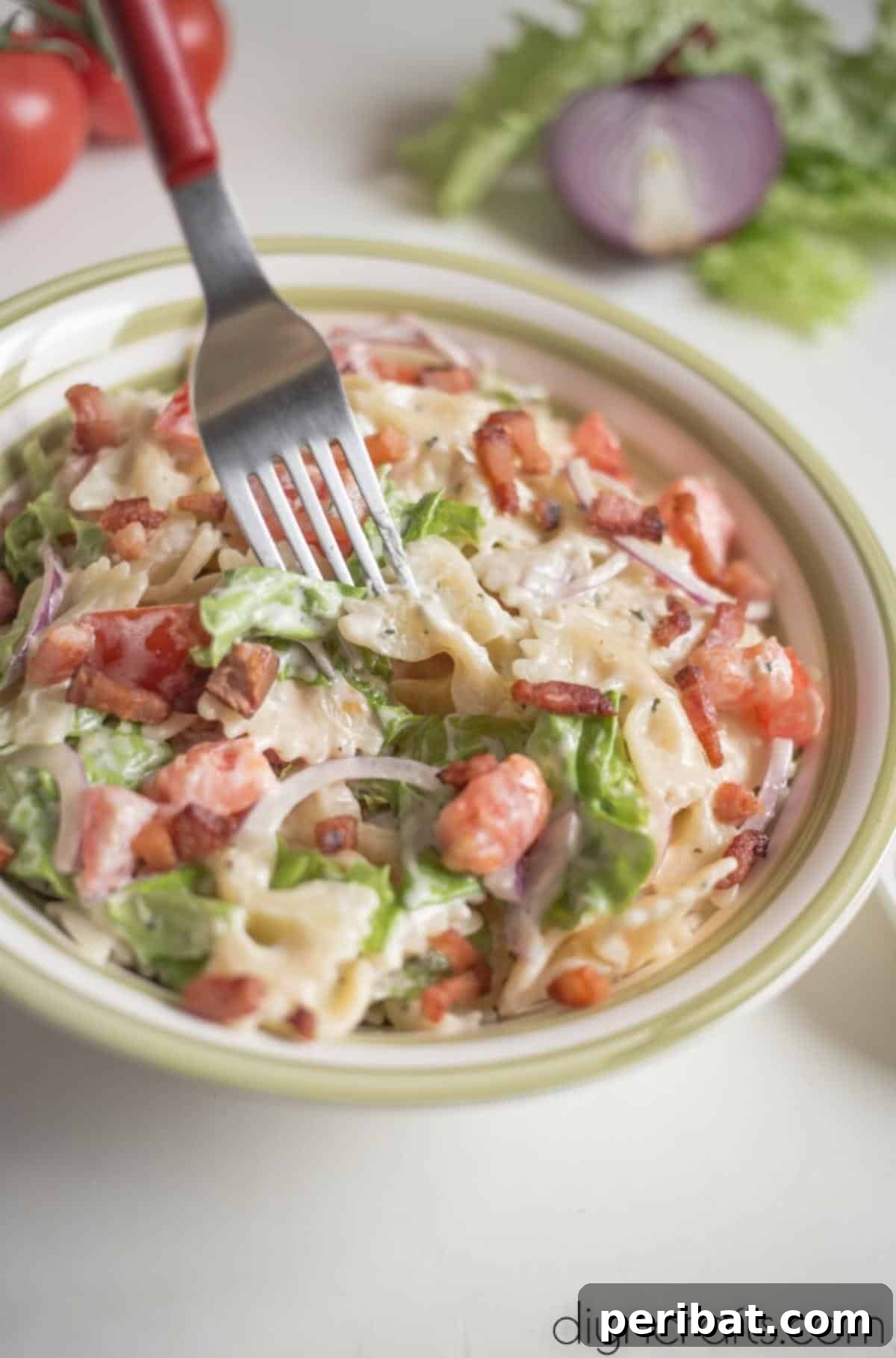 Irresistible BLT Pasta Salad: Recipe Requests Guaranteed 8 Close-up view of a serving of finished BLT pasta salad.