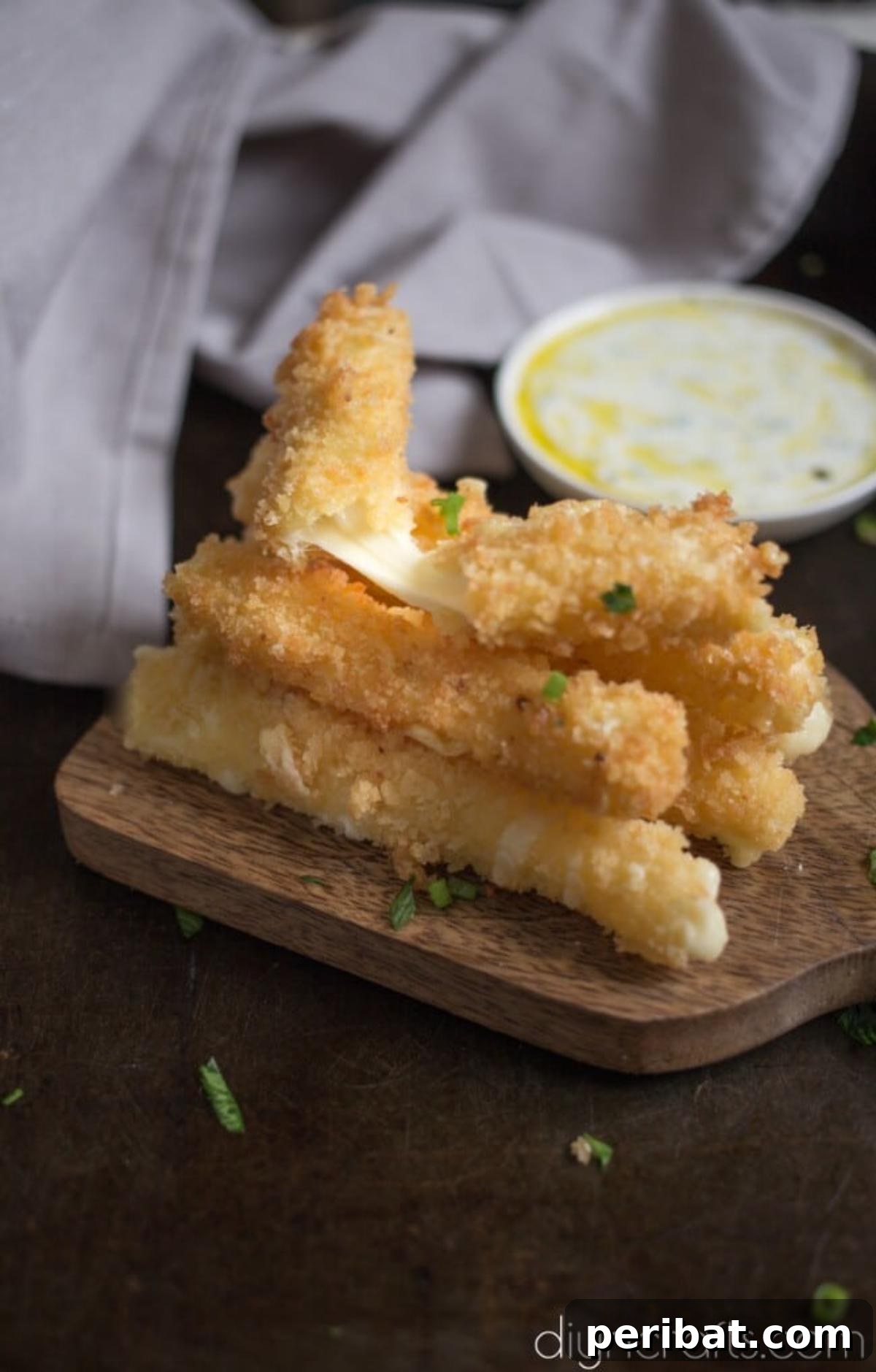 Crispy Gooey Cheese Sticks with Cool Buttermilk Sauce 6 Cheese sticks fry up crispy and delicious.