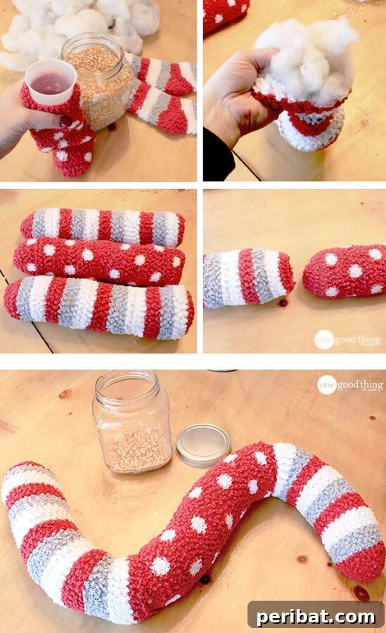 Effective DIY door draft stopper created from multiple old socks filled with quilt batting.