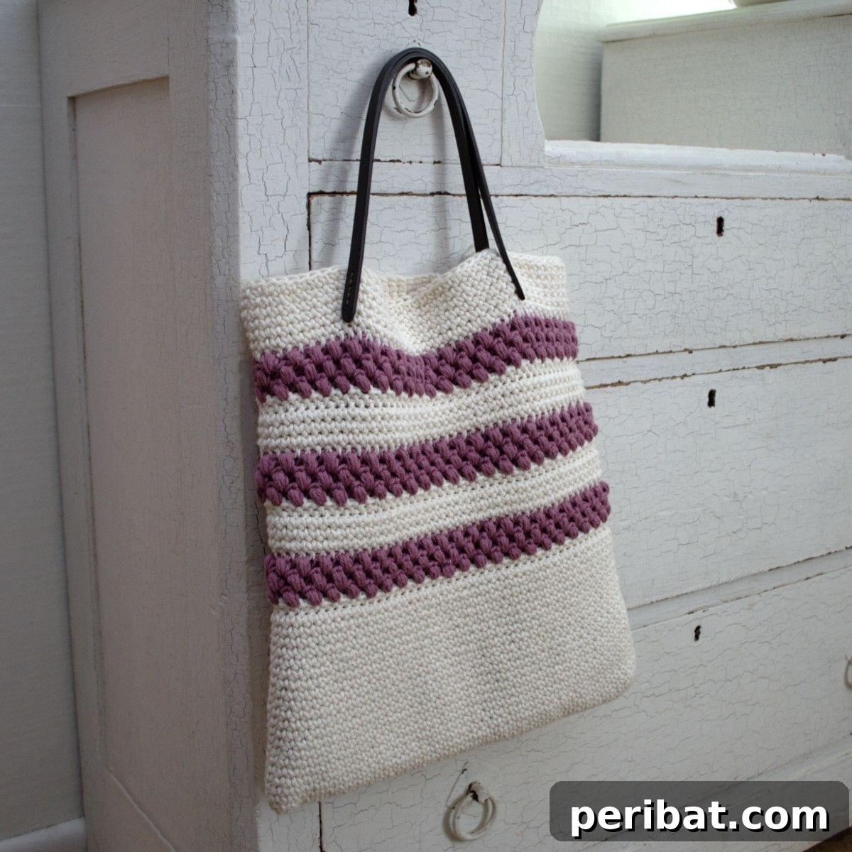 Easy Crochet 120 Free Patterns for Beginners 14 Striped crochet bag hanging on drawer knob