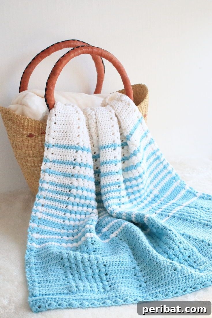 Easy Crochet 120 Free Patterns for Beginners 21 Blue and white striped blanket in basket