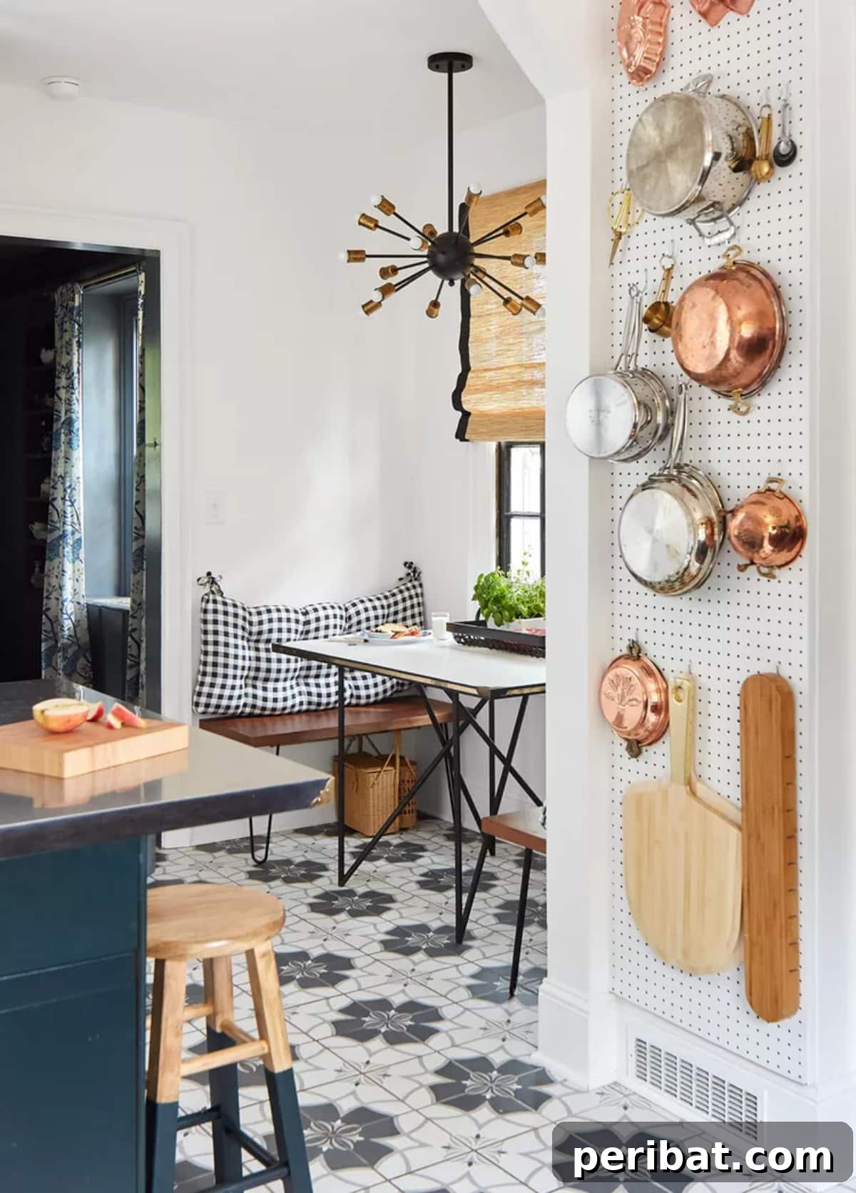 DIY Pegboard Kitchen Storage with hanging pots and utensils