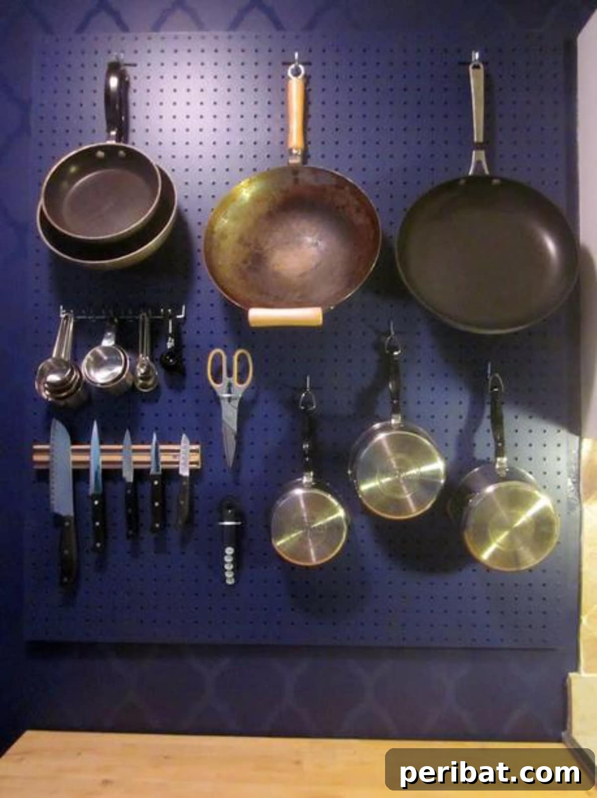 DIY Kitchen Pegboard Wall Organizer with utensils