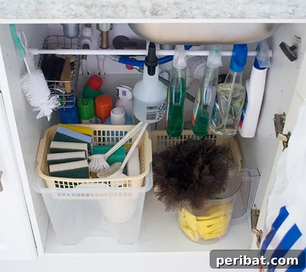 DIY Under Sink Organizing with tension rod and baskets