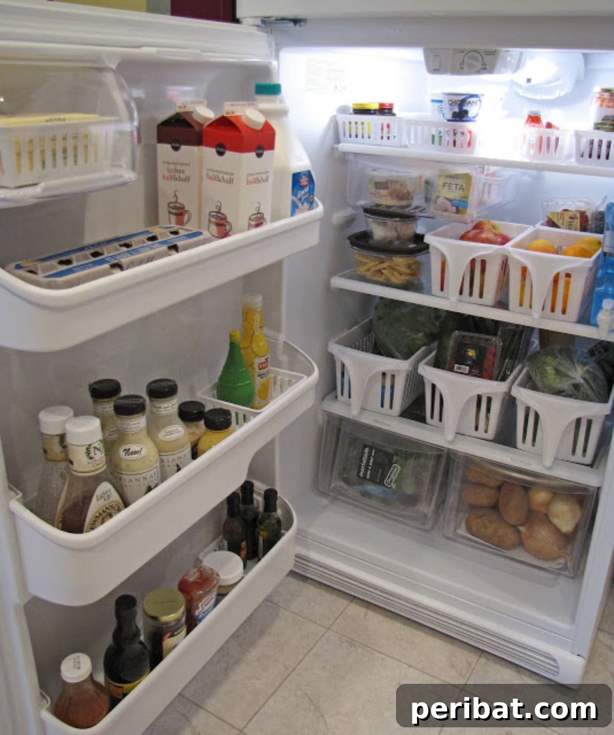 DIY refrigerator organization with clear bins