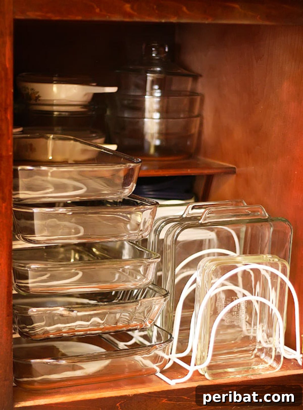 DIY Kitchen Cabinet Organization with stackable racks