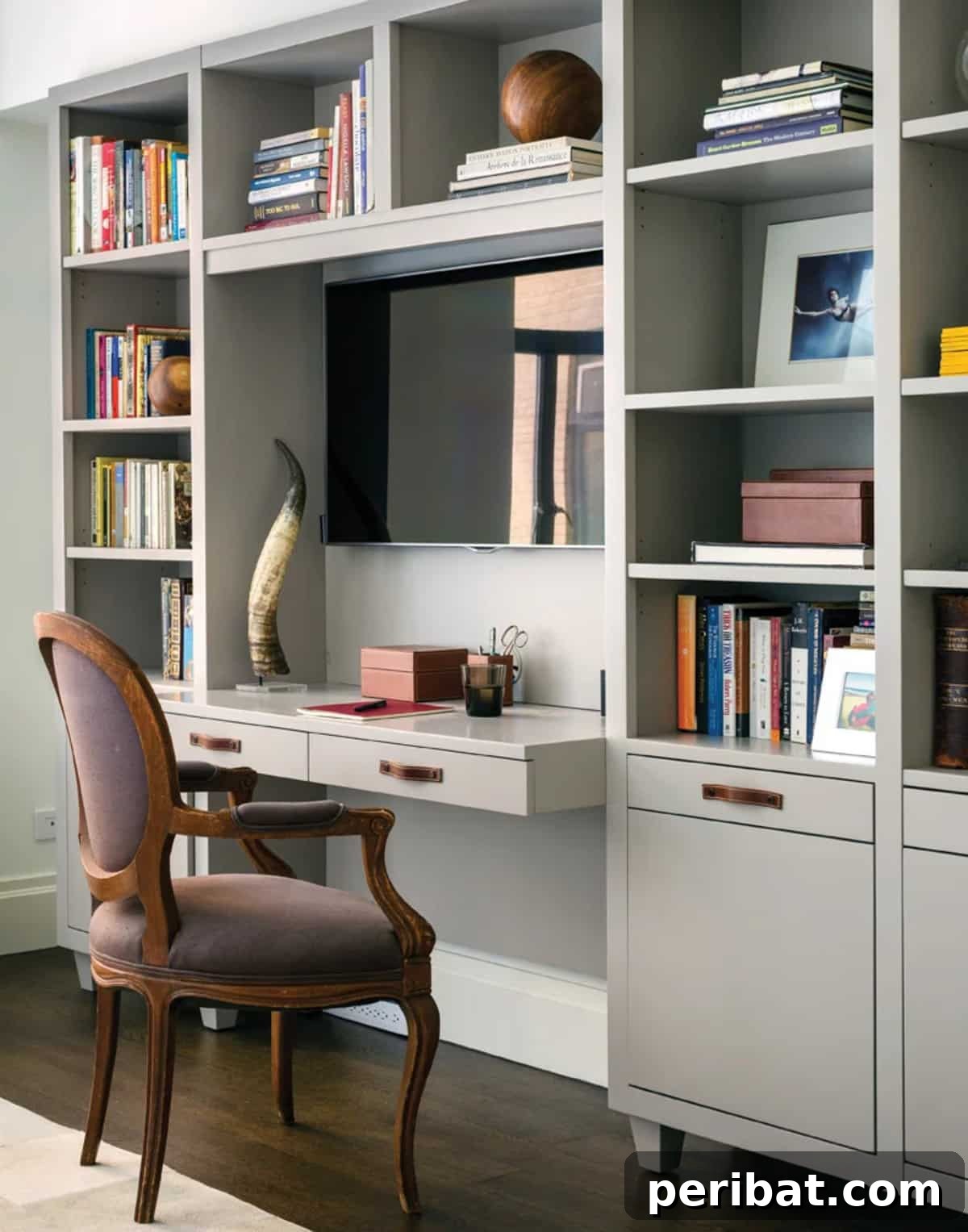 A multi-functional console table cleverly integrating a desk, shelves, and filing cabinets for a combined media center and home office.