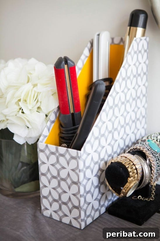 Simplify Your Space: 25 Must-Try Organization Tips 9 Magazine file for hair tool storage
