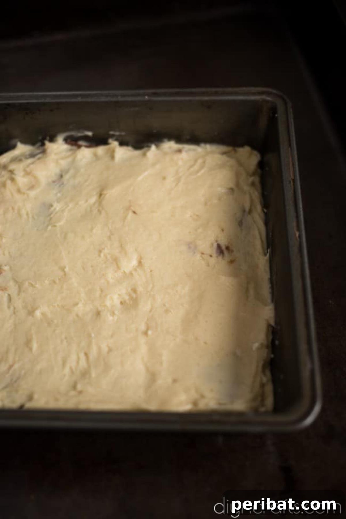 Nutella Stuffed Blondies Your Perfect Anytime Treat 5 Layering Nutella between two layers of blondie batter in a baking pan