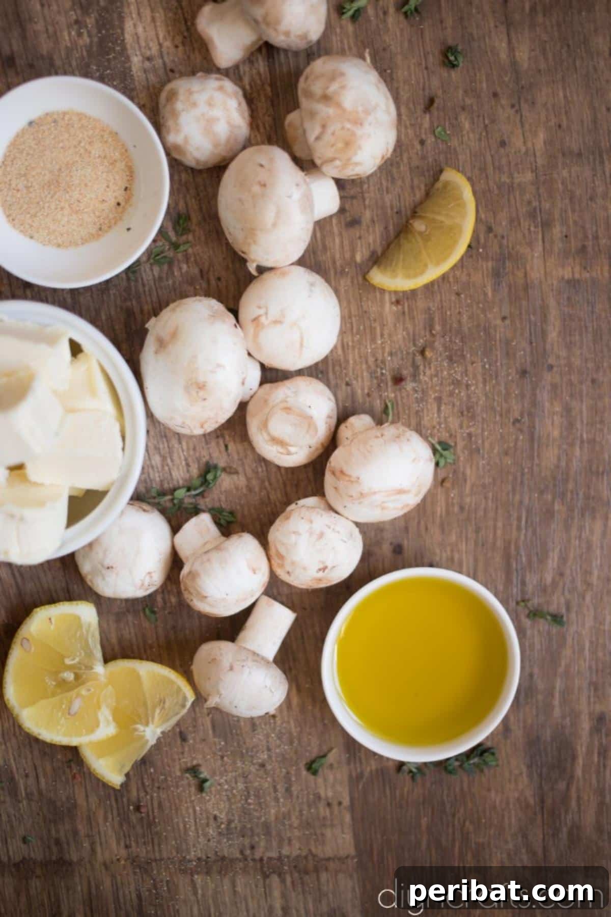 Effortless Elegance Garlic Thyme Roasted Mushrooms 3 Fresh ingredients are prepped for Roasted Mushrooms with Garlic and Thyme, including whole mushrooms and aromatic herbs.