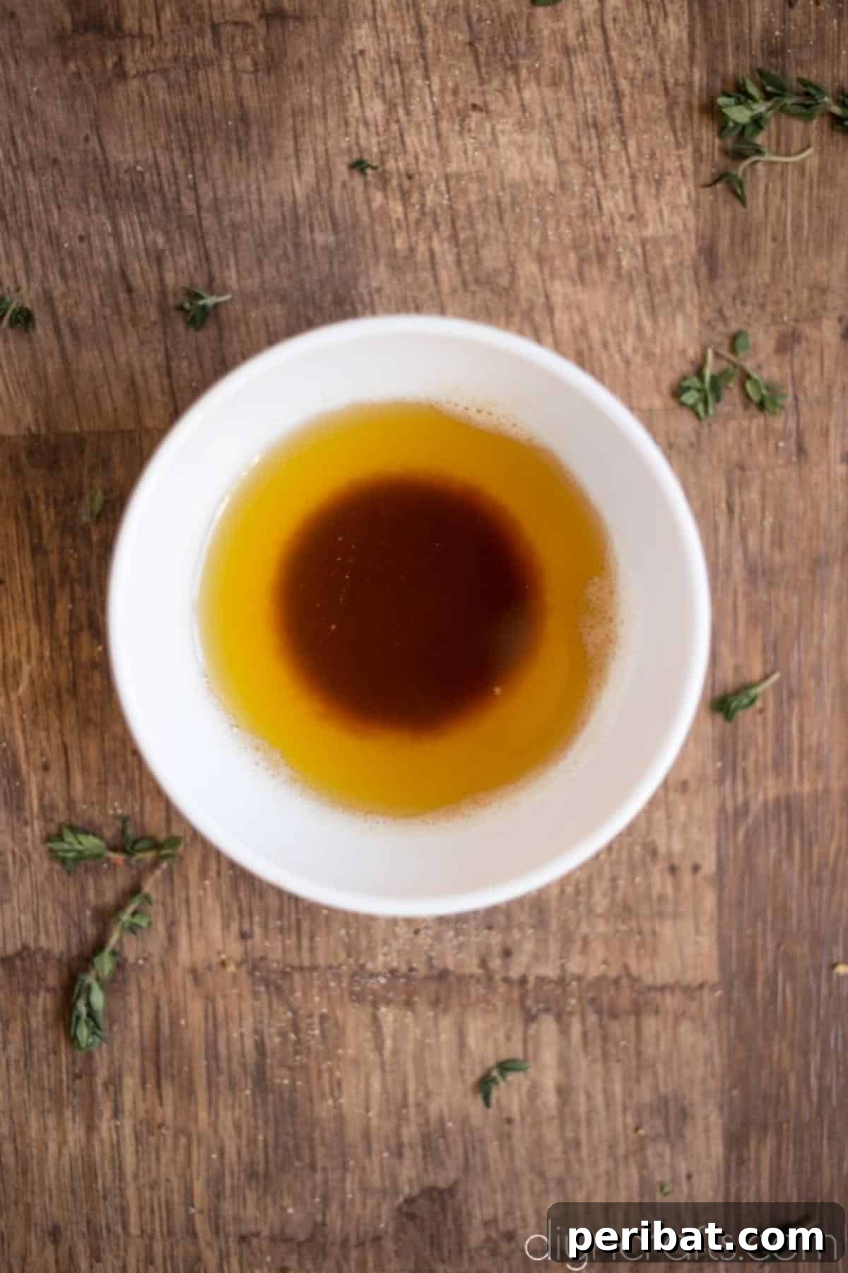 Effortless Elegance Garlic Thyme Roasted Mushrooms 4 Butter is expertly browned in a saucepan, ready for the addition of lemon zest and other flavorings.
