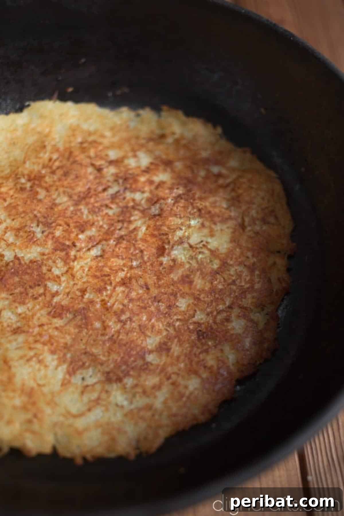 Crunchy Potato Pancakes: A Flavorful Twist on Breakfast Classics 5 Cooking the potato pancake.